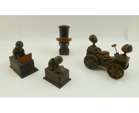 A COLLECTION OF THREE, POSSIBLY BLACK FOREST, WOODEN AUTOMATON, together with a TREEN GAMES/DICE SHAKER, the top hat unscrews