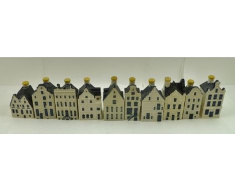 A COLLECTION OF TEN VARIOUS CERAMIC MODELS OF DELFT HOUSES made by KLM to contain Bols alcoholic drink, 11cm high 