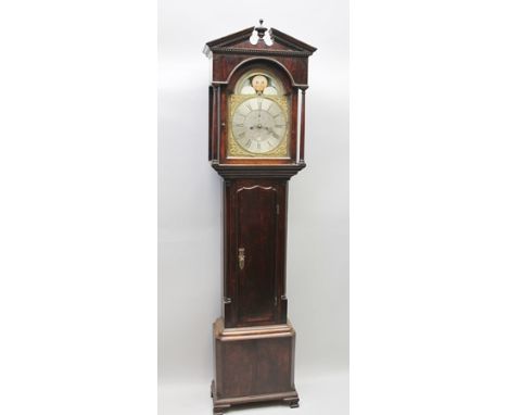 ROBERT NEVINSON, KENDAL A 19TH CENTURY OAK LONGCASE CLOCK having swan neck pediment over arched silvered and brass dial with 