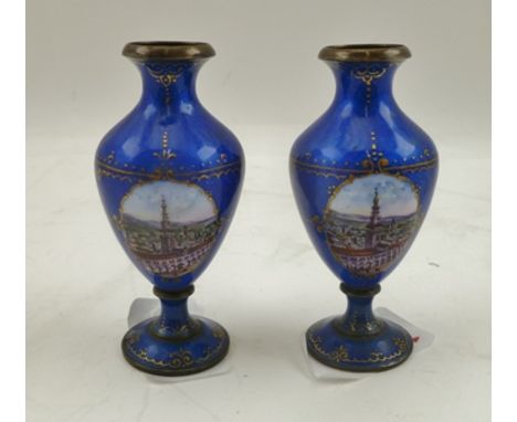 A PAIR OF ENAMEL VASES of baluster form with blue guilloche enamel ground with hand painted city landscape decoration, possib
