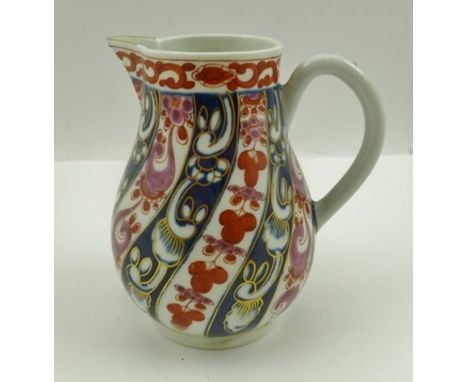 A FIRST PERIOD WORCESTER SPARROW BEAK PORCELAIN JUG of baluster form, decorated with the "Queen Charlotte" pattern in Imari c