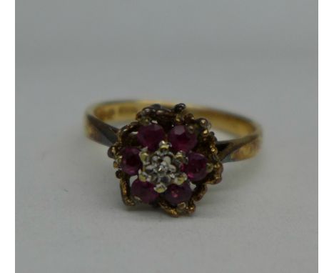 A 9ct gold, diamond and red stone ring, 2.5g, K