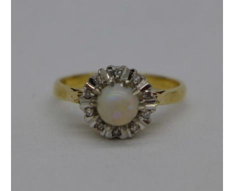 An 18ct gold, opal and diamond ring, 2.7g, K