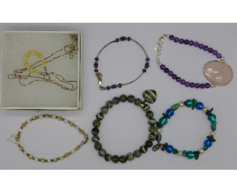 A silver and opal pendant and chain and five gem set bracelets with silver clasps