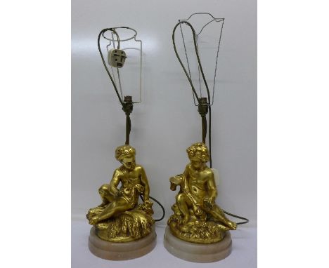 A pair of gilt figural table lamp bases