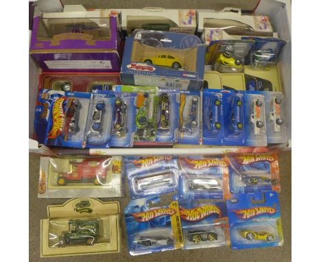 Approximately thirty die-cast vehicles including Corgi, Hot Wheels, etc.