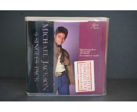 Vinyl - Michael Jackson 9 singles pack on Epic, in PVC fold out wallet, picture sleeve singles on red vinyl.  Vg- 