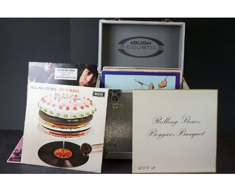 Vinyl - 24 Rolling Stones and related LP's, contained in a metal storage box, to include Let It Bleed, Beggar's Banquet, Betw