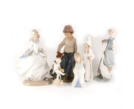 Four Lladro figures, including Girl with Goose, Bride with flowing dress, Girl dressed as Pierrot, and another girl; one Nao 