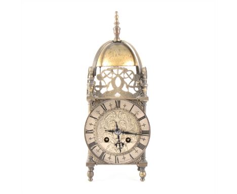 A French brass lantern clock, Japy Freres cylinder movement the silvered chapter ring signed John Perry Nottingham, 30cm.