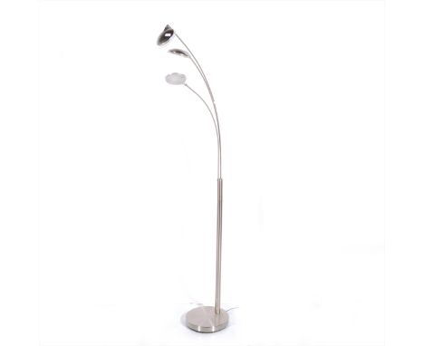 A contemporary brushed metal three-light standard light, height 165cm.