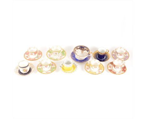 A collection of decorative tea cups / coffee cans and saucers, various factories including Worcester, Wedgwood, Aynsley, etc