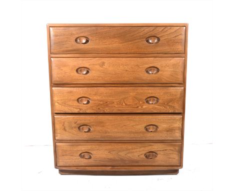An Ercol light elm chest of drawers, fitted with five long drawers, width 93cm.