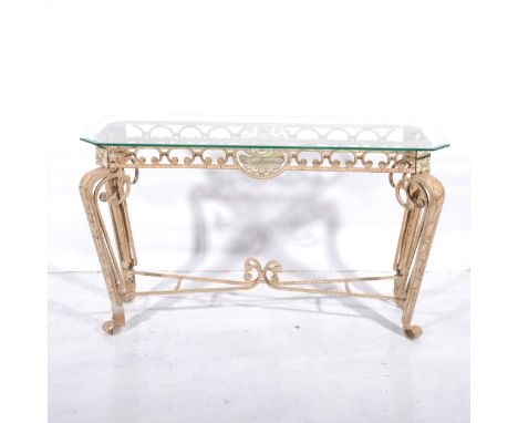 A contemporary metal based console table, with a plate glass top, scrolled legs joined by rails, 122cm x 46cm.