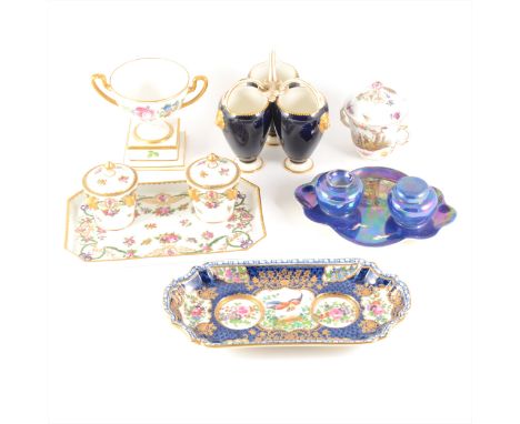 A Royal Worcester triple-cluster vase, loop handles, lion head masks, 12.5cm, a Continental porcelain desk stand, 22.5cm wide