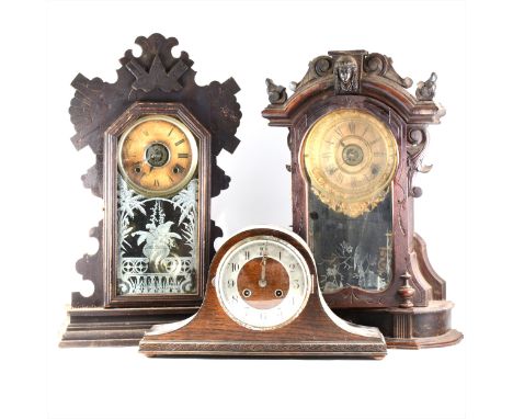 Two Continental shelf clocks, stained wood cases, as found, and an oak 1930s mantel clock. (Qty: 3)