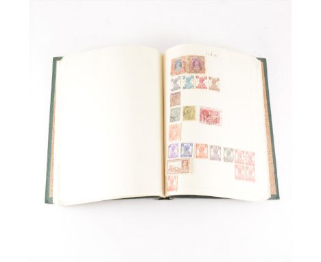 Small worldwide stamp collection, in a single green album.