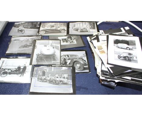 A group of vintage early motoring photos and negatives including John Cobb's 1947 landspeed record car and an enlarger