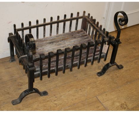 A cast iron fire grate and dogs Grate W58cm