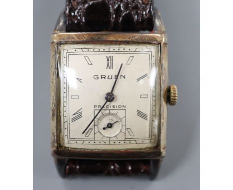 A gentleman's 1930's? 10k gold filled Gruen Precision manual wind wrist watch, with rectangular Roman and baton dial, with su