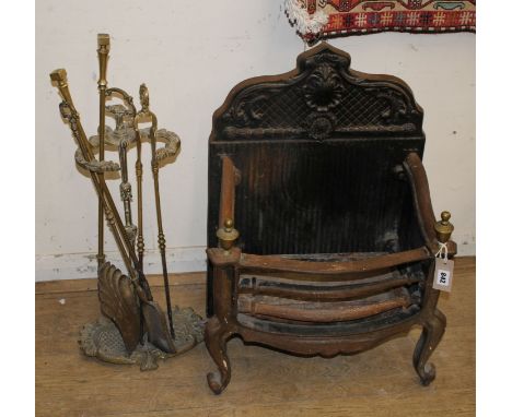 A cast iron serpentine fire grate and implements Grate W.48cm