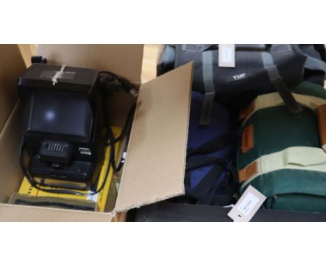 Photography equipment including a Canon EOS 1000F SLR camera, a Canon UC-X50 Camcorder, Campro Cine Camera, etc