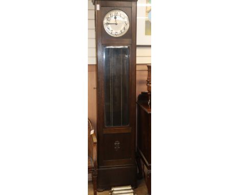 A 1920's oak cased eight day striking and chiming longcase clock H.214cm