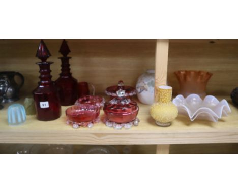 A pair of Victorian ruby glass decanters, cranberry and mixed cut glass