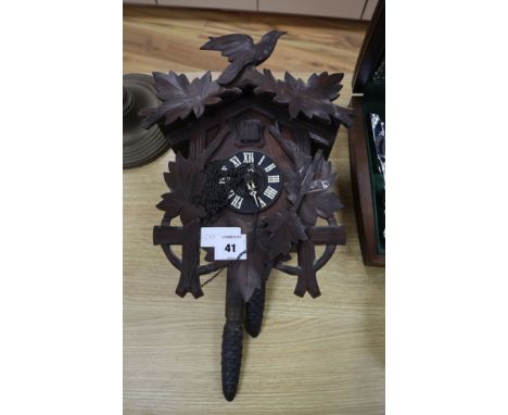 A Black Forest cuckoo clock H.38cm