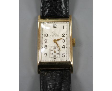 A gentleman's 1950's 9ct gold Record manual wind wrist watch, with rectangular starburst Arabic dial and subsidiary seconds, 