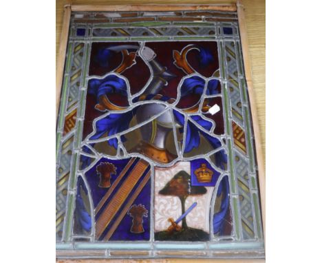 A 19th century stained glass panel in a bamboo frame 49 x 36cm