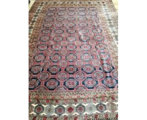 A Turkman carpet 345 x 245cm