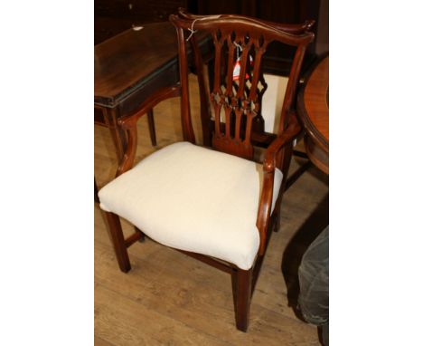 A set of ten Chippendale style mahogany dining chairs (two with arms)