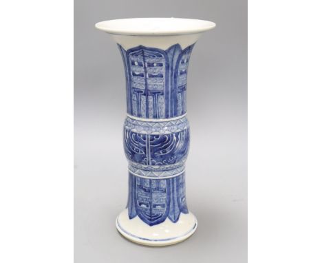 A Chinese blue and white beaker vase, Gu Kangxi mark but later H.34cm