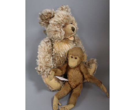 A Steiff Zotty bear c.1950's, chest tag but no button, good condition and a Steiff monkey c.1920, some thinning, with button,