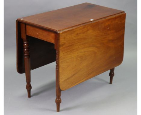 A 19th century mahogany drop-leaf dining table with rounded corners to the rectangular top, &amp; on four ring-turned tapered
