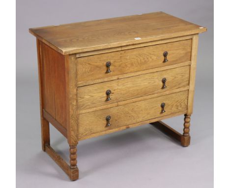 A 1930’s small oak chest fitted three long drawers, &amp; on short bobbin-turned legs, 36” wide x 30½” high x 17¾” deep. 