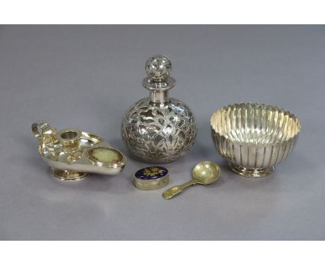 A late Victorian silver fluted bowl on a round pedestal foot, 4¾” diameter, London 1893; a silver-overlaid glass toilet-water