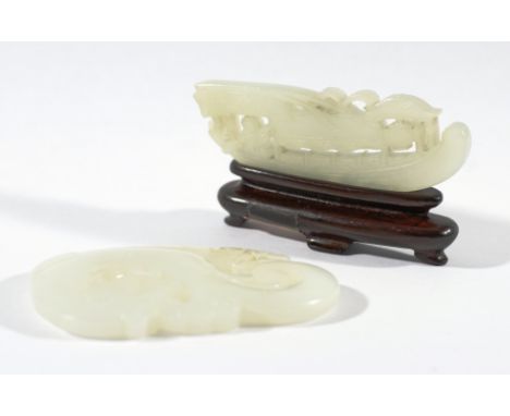 CHINESE WHITE JADE PENDANT, carved and reticulated in the form of a chilong, length 6cm; together with another carving of a s