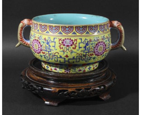 CHINESE FAMILLE ROSE CENSER, Qianlong mark but probably later, enamelled with chrysanthemums and scrollwork on a yellow groun