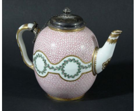 SEVRES TEAPOT, circa 1770, of ovoid form painted with a band of berry foliage on a pink oeil de perdrix ground, with a later 