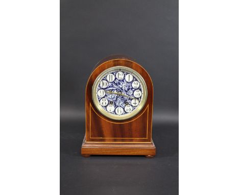 AESTHETIC MOVEMENT MANTLE CLOCK with a floral pottery dial and mahogany case, and with turned wooden feet. 29.5cms high