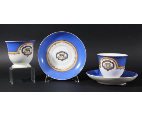 SEVENTH MADRAS CAVALRY: a pair of English porcelain armorial breakfast cups and saucers, early 19th century, painted with an 
