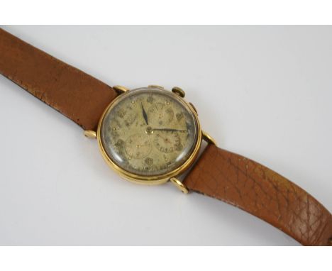 A GENTLEMAN'S 18CT GOLD MANUAL CHRONOGRAPH WRISTWATCH the gold coloured dial with Arabic numerals, 35mm diameter, on a tan le