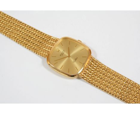 A GENTLEMAN'S 18CT. GOLD MECHANICAL WRISTWATCH BY ROLEX CELLINI the signed cushion-shaped dial with baton numerals, on an int