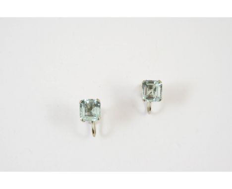 A PAIR OF AQUAMARINE EARRINGS each earring set with a step-cut aquamarine in white gold, with screw fittings