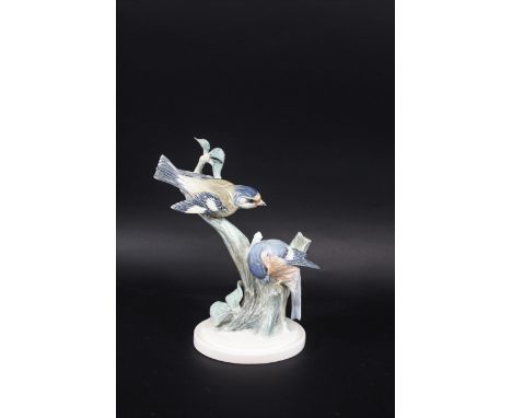 ROYAL WORCESTER - BIRDS ON BRANCHES possibly a prototype model, with two coloured birds on tree branches. Unmarked. 26cms hig
