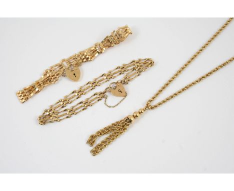 A 9CT GOLD TASSEL NECKLACE 40cm long, 12.1 grams, and two 9ct gold gate link bracelets, with padlock clasps, 8.6 grams