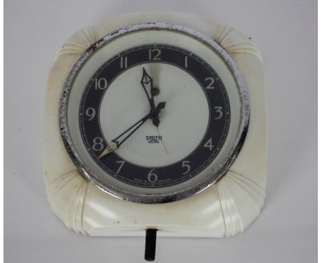 A Smiths Sectic Bakelite cased electric wall clock, 16cm x 16cm 