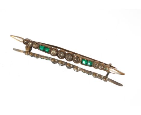 An Art Deco style clip set with red and white stone; an Art Deco style bar brooch set with green and white stones and three A